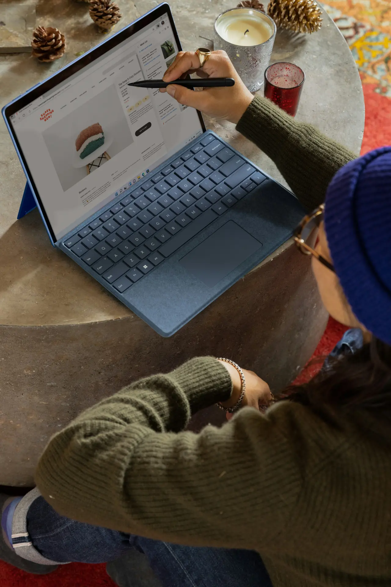 Professional analyzing data on a laptop, preparing a business report